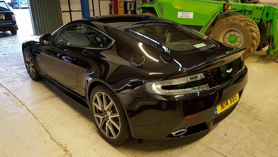 Rear view of a black Aston Martin from WK’s gallery